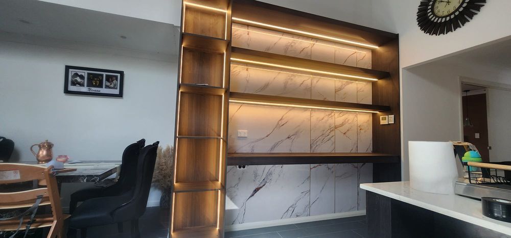 LED strip lighting built into marble feature shelving