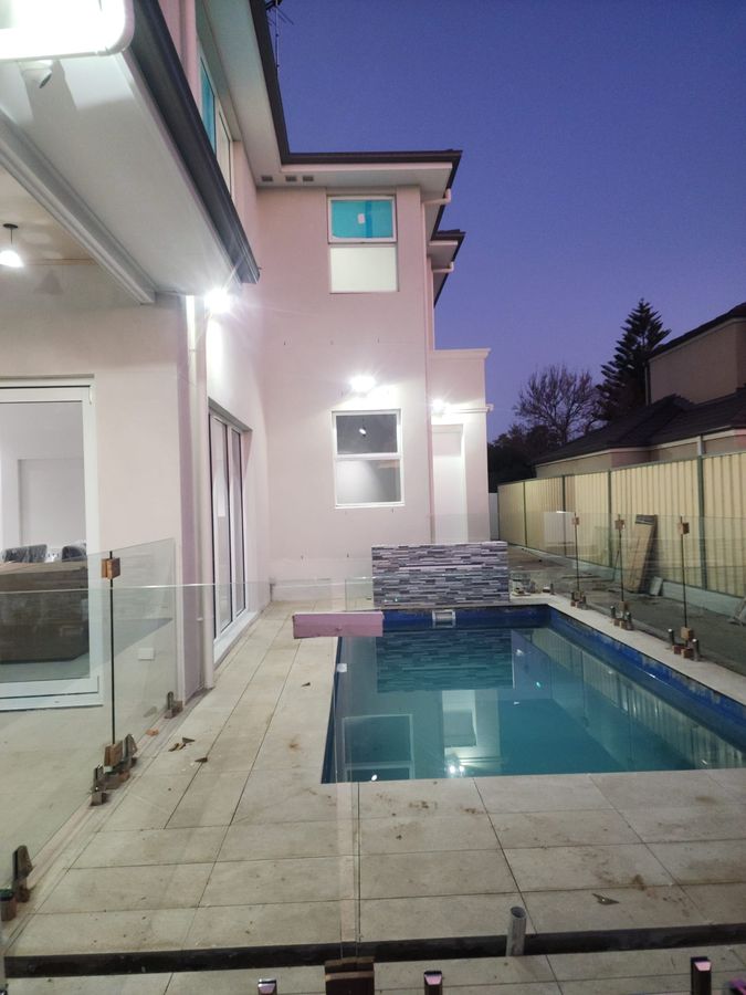 Outdoor and pool area lighting at dusk