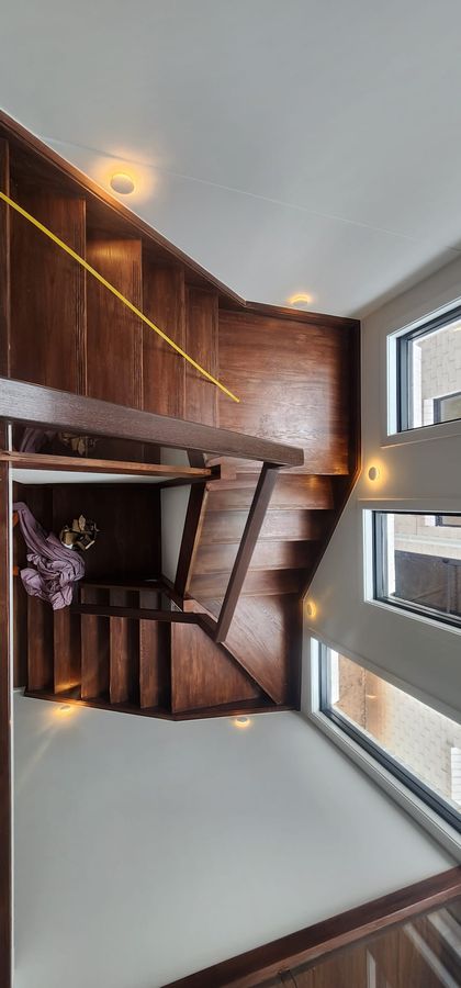 Staircase with LED step and wall lighting